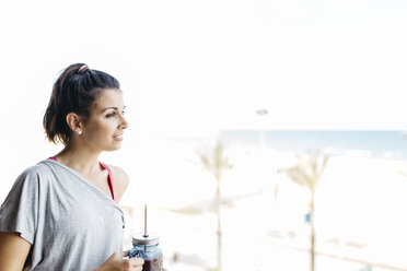 Young woman with healthy drink - JRFF000742