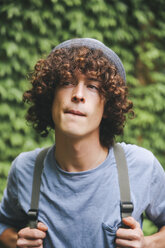 Portrait of pensive young man with curly hair - RTBF000229