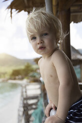 Thailand, portrait of blond toddler in a in beach hut - SBOF000030
