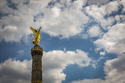 Germany, Berlin, view of victory column against cloudy sky - NKF000468
