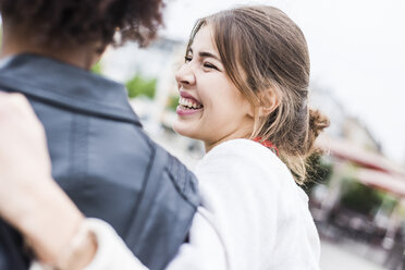 Portrait of happy young woman and her best friend - UUF007653