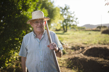 Portrait of a farmer with hatchet on his shoulder - RAEF001219