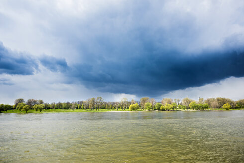 Germany, North Rhine-Westphalia, Rhine riverbank and stormy atmosphere - SKAF000014