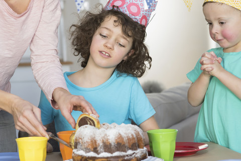 Girl's birthday party with cake stock photo