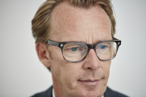 Portrait of businessman wearing glasses - RHF001605