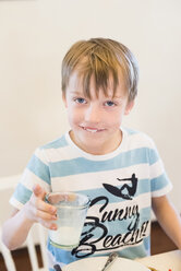 Boy drinking glass of milk - MJF001846
