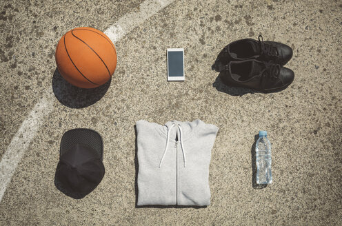 Basketball items lying on ground of basketball court - DAPF000187