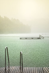 Germany, Bavaria, Burghausen, summer rain at Woehrsee, bathing jetty - HAMF000208