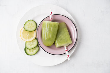 Enamel dish of homemade cucumber lemon popsicles - MYF001605