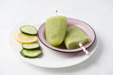 Enamel dish of homemade cucumber lemon popsicles - MYF001606