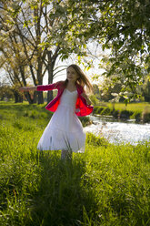 Girl dancing on a meadow - SARF002802