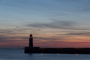 Germany, Bremerhaven, Weser with lighthouse at sunset - SJF000173