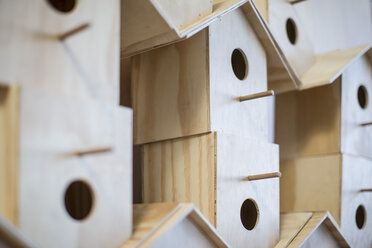 Close-up of stacked birdhouses - ZEF008801