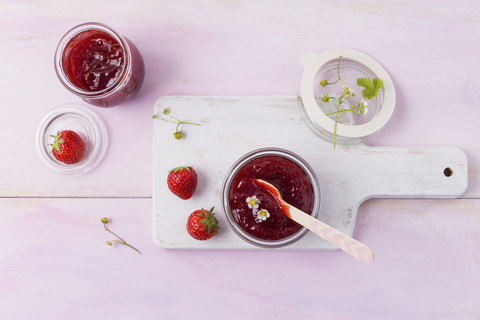 Strawberry jam, open glas stock photo