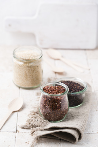 Three glasses of different quinoa stock photo