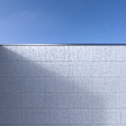 Betonwand vor blauem Himmel, 3D Rendering - UW000914