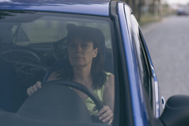 Woman driving a car - SKCF000096