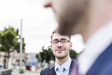 Two businessmen in the city, close up - UUF007976