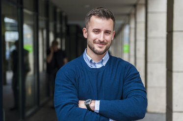 Portrait of smiling young man outdoors - DIGF000691