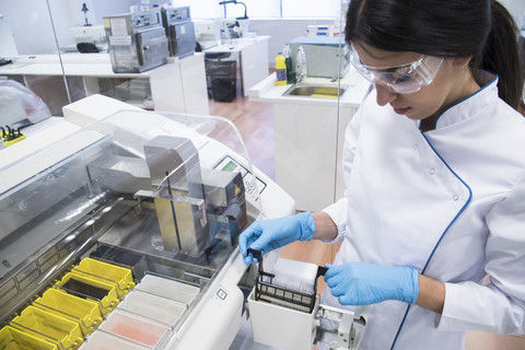 Laboratory technician in analytical laboratory stock photo