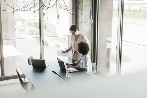 Two women in an office - UUF008215