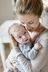 Mother with baby boy at home - HAPF000640
