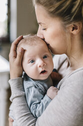 Mother with baby boy at home - HAPF000643