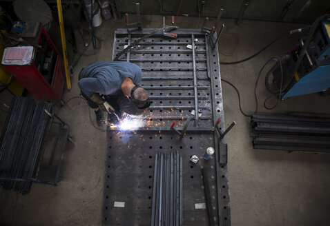 Metal construction, welder welding railing - REAF000091