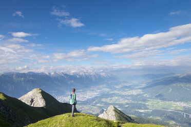 Austria, Tyrol, hiker looking to Innsbruck - MKFF000306