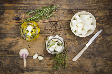 Glass of diced sheep cheese pickled in olive oil, thyme, garlic, pepper and rosmary - LVF005150