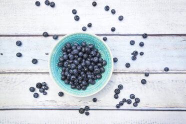 Bowl of blueberries on wood - LVF005188