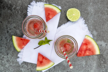 Two carafes of infused water with watermelon and lime - SARF002831