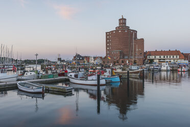 Germany, Schleswig-Holstein, Eckernfoerde, fishing harbour and round silo - KEBF000389