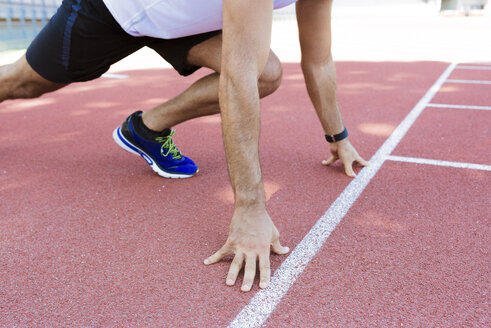 Young sportsman in starting position - FMOF000076