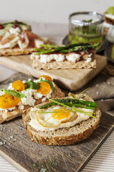Healthy toast made with asparagus cheese egg and yellow tomato - VABF000725