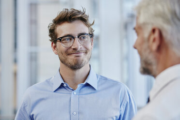 Two businessmen talking together - RORF000219