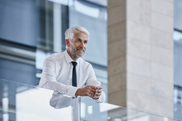 Businessman relaxing with coffee - RORF000244