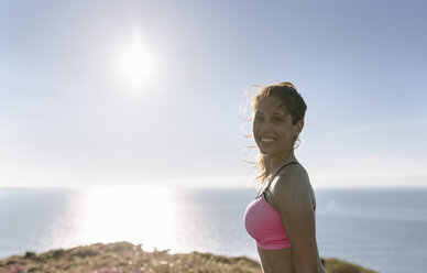 Spain, Asturias, portrait of a sportswoman, smiling - MGOF002194