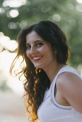 Portrait of smiling woman with long brown hair - SKCF000163