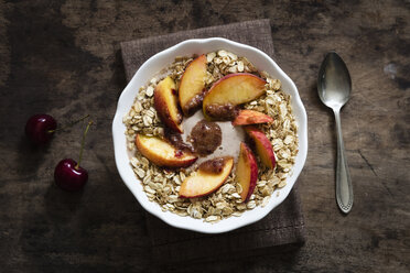 Cherry smoothie bowl with peach and oat flakes, topping - EVGF003048