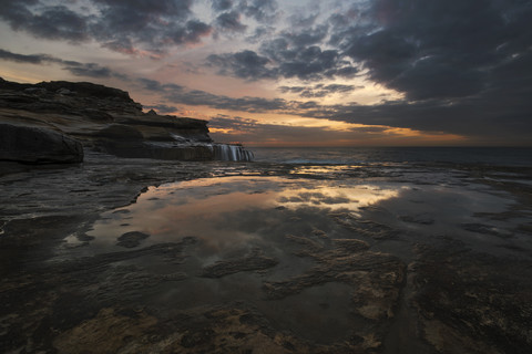 Australien, New South Wales, Maroubra, Küste bei Sonnenuntergang, lizenzfreies Stockfoto