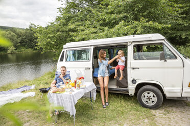 Family with van at lakeside - FMKF002834