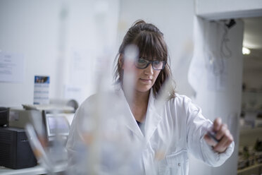 Young woman working in lab - ZEF009793