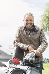 Portrait of happy biker - JUNF000580