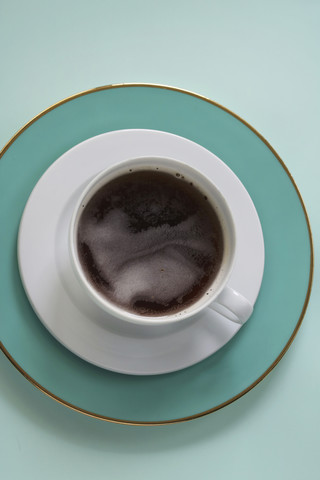 Place setting with cup of black coffee stock photo