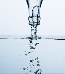 Mineral water pouring from bottle - PPXF000028