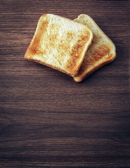 Toast auf dunklem Holz - PPXF000030