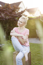 Portrait of blond woman in garden - SHKF000671