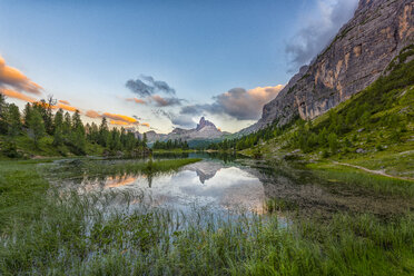 Italy, Veneto, Dolomites, Lake Federa and peak Becco di Mezzodi at sunset - LOMF000376