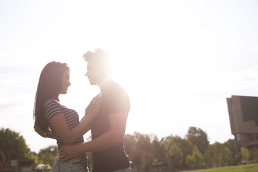 Young couple outdoors at sunset - SIPF000801